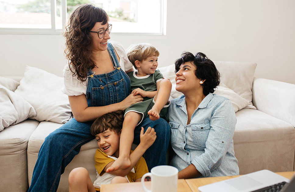 Family together sitting on a couch