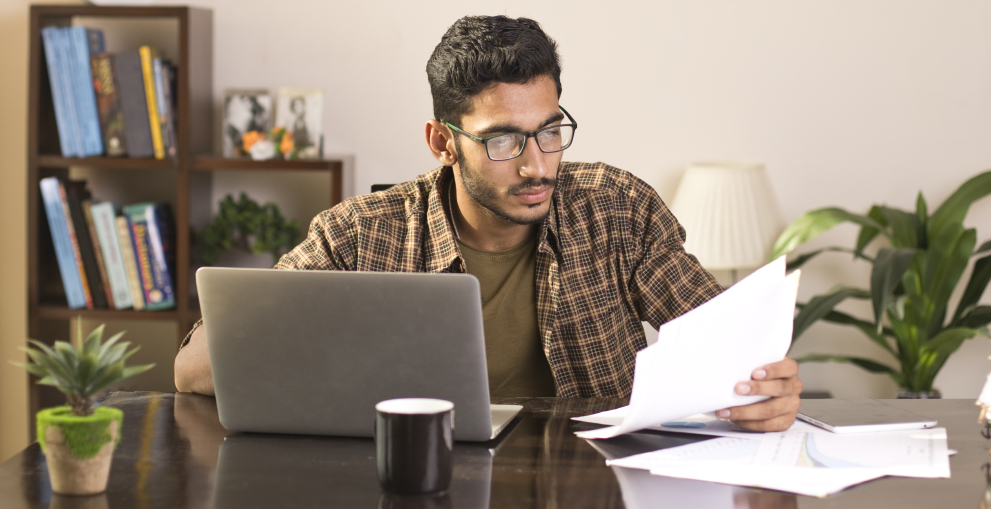 man with laptop at table